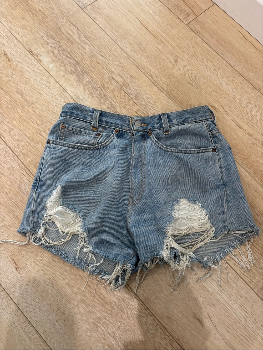 Vintage Levi's Light faded Blue Distressed High-Waist Denim Shorts